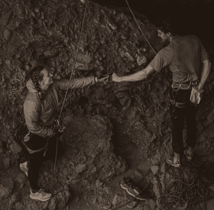 Two climbers at the wall